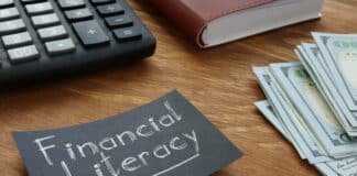 Financial Literacy is shown on the conceptual business photo